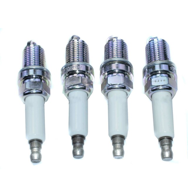 Set of 4 Spark Plugs For Audi A3 A4 A5 A6 Q5 VW Passat Golf 06H905601A