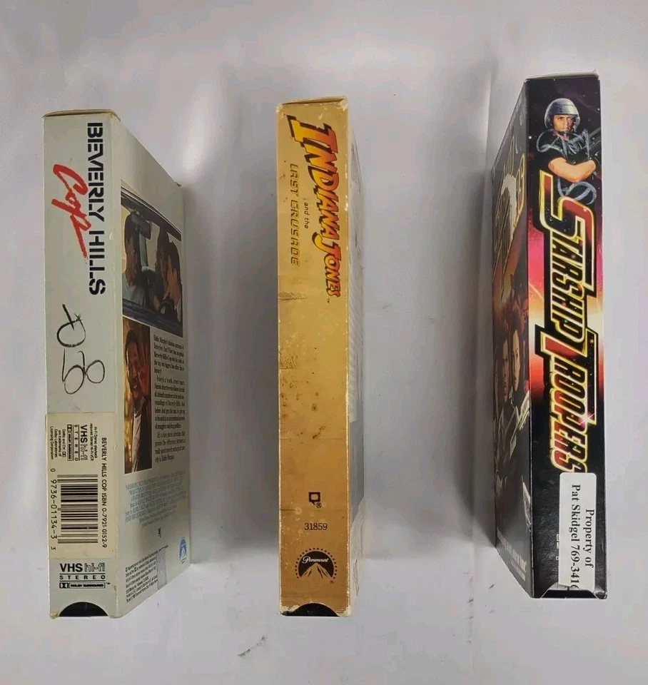 VHS Lot  Beverly Hills Cop, Indiana Jones Last Crusade, Starship Troopers  Foto 2 de 3