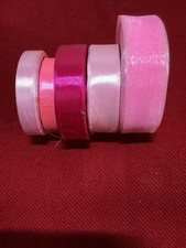Various Rolls of Pink Ribbon for Gift Wrapping