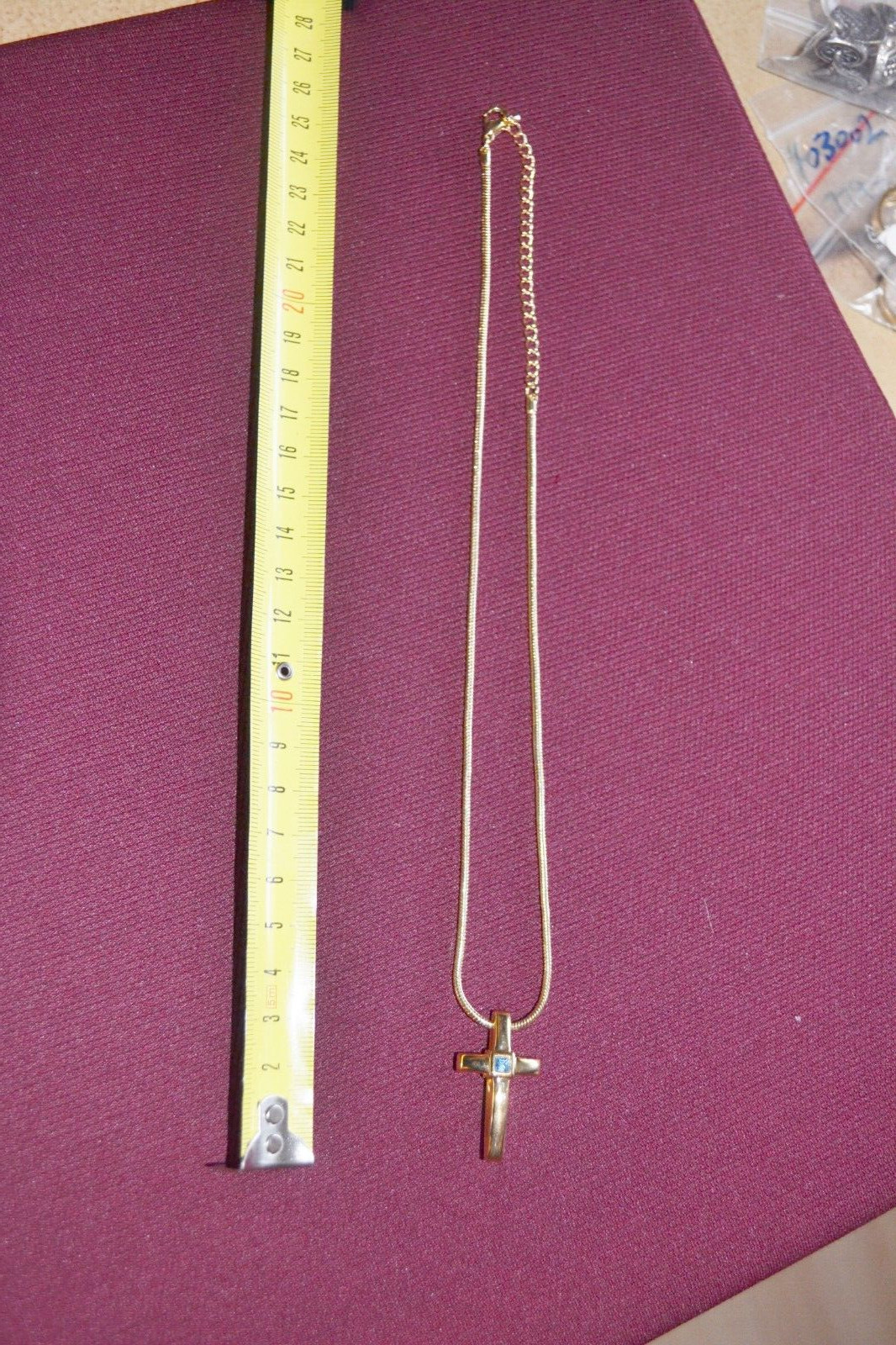 Kreuz am Halskettchen