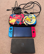 Nintendo Switch Oled Console Red/Blue Joy-Con, Dock, USB-C Charger, Carry Case