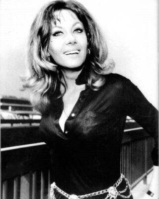 Ingrid Pitt in low cut shirt 1970's smiling pose Hammer Horror star