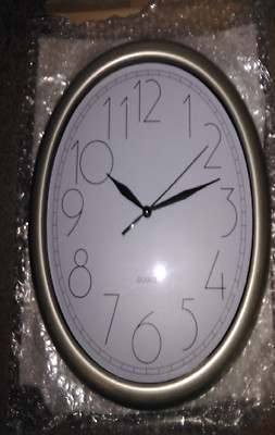 *NEW* ITC 11'' OVAL WALL CLOCK 32040-NI NICKEL WITH BLACK LETTERING QUARTZ 