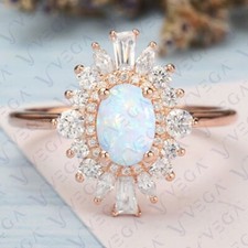 5.70ct Oval Natural Multicolor Opal Gemstones...