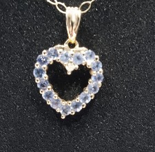 Lovely 9ct gold with tanzanite gems, set as a  heart shaped pendant. Price Drop.
