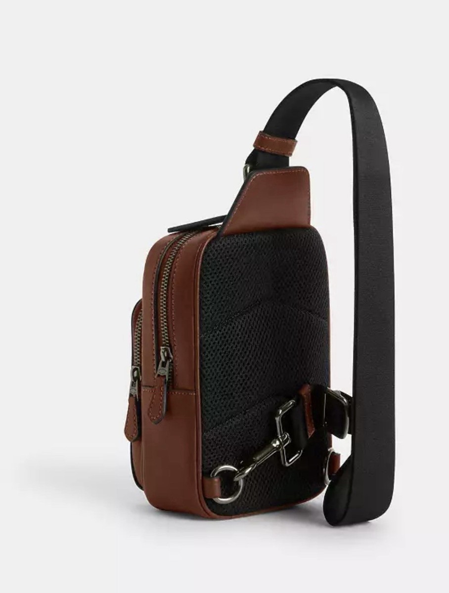 人気☆スヌーピーコラボ【Coach X Peanuts】スリングパック Peanuts x Coach Outlet Racer Sling Pack Signature Canvas