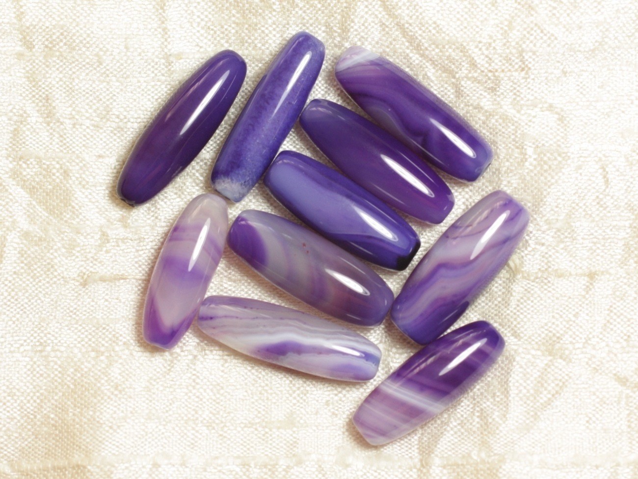Agate violette perles fuseaux 30mm pour rompre la monotonie