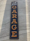 Full Service Garage Orange Embossed Tin Sign