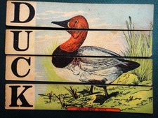antique SLICED PUZZLE DUCK Selchow  Righter strips toy