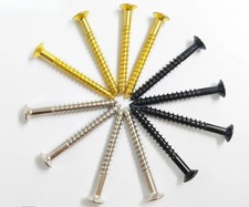 A pack of 4 guitar neck and electric guitar neck mounting screws