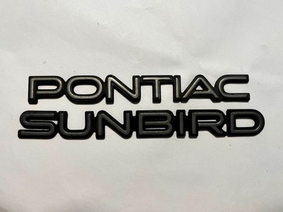 VINTAGE PONTIAC SUNBIRD 88-91 REAR TRUNK EMBLEM BADGE LOGO SET GENUINE OEM USED