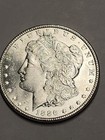 1886 $1 Morgan Silver Dollar — photo 1