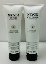 2 nioxin 2 for noticeably thinning/fine hair natural 4.2oz ea scuffed exterior