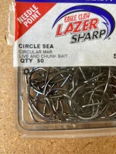 50 Eagle Claw L2002ELFH- Size 5/0 Black Platinum Circle Sea Hook