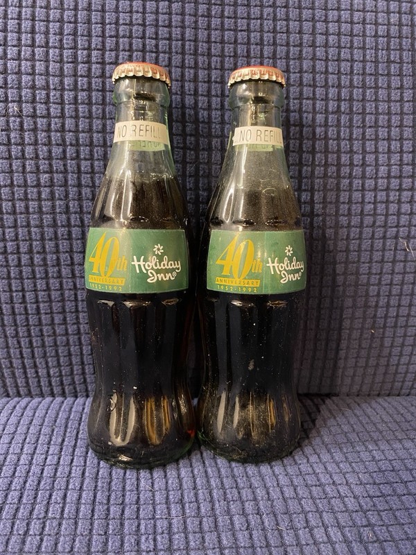 Sealed Holiday Inn 40th anniversary Coca-Cola bottles