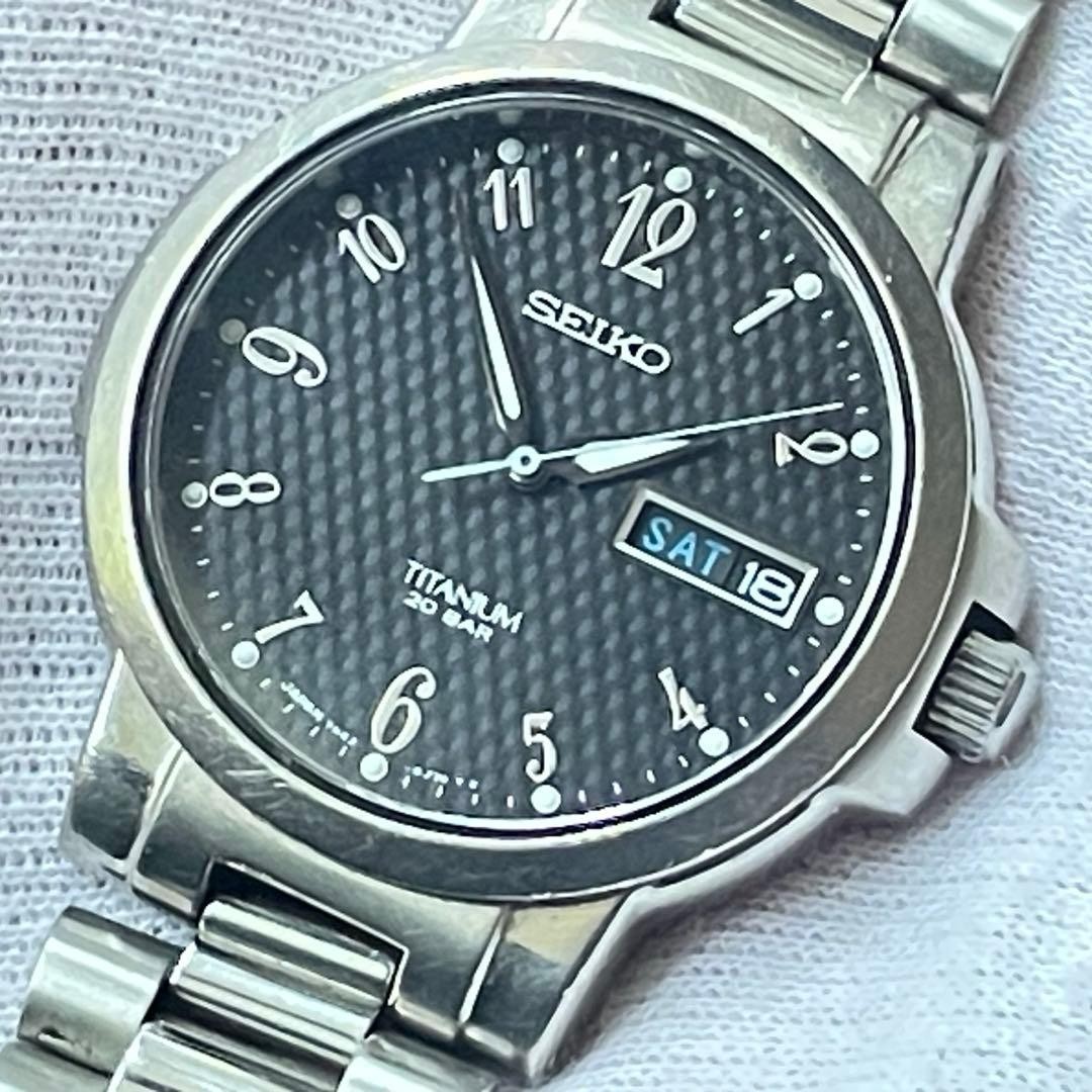 Seiko 7N43-7B80 Titanium Quartz Men's Watch Black Dial 36mm Analog