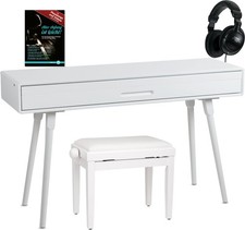 Eleganter Tisch in Weiß matt mit Zubehör, der sich in ein Piano verwandelt