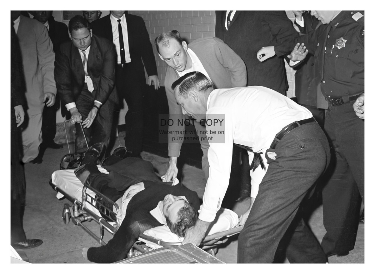 LEE HARVEY OSWALD ON STRETCHER AFTER BEING SHOT BY JACK RUBY JFK