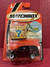 2005 Matchbox #20 Lincoln Navigator (Dk. Red) Treasure Card