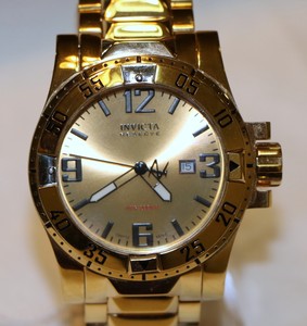 invicta excursion gold
