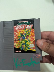 Kevin Eastman firmato Teenage Mutant Ninja Turtles NES gioco con certificato di autenticit&agrave; - cartuccia 