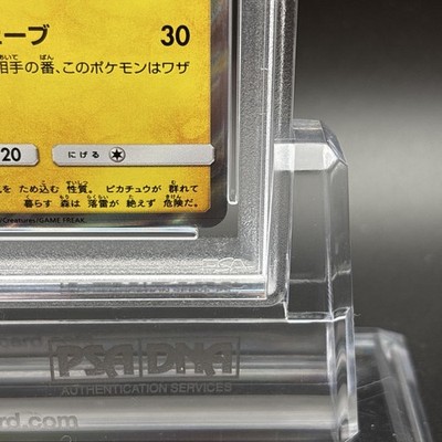 PSA 10 Surfing Pikachu 329/SM-P Playing in the Sea Promo Pokemon