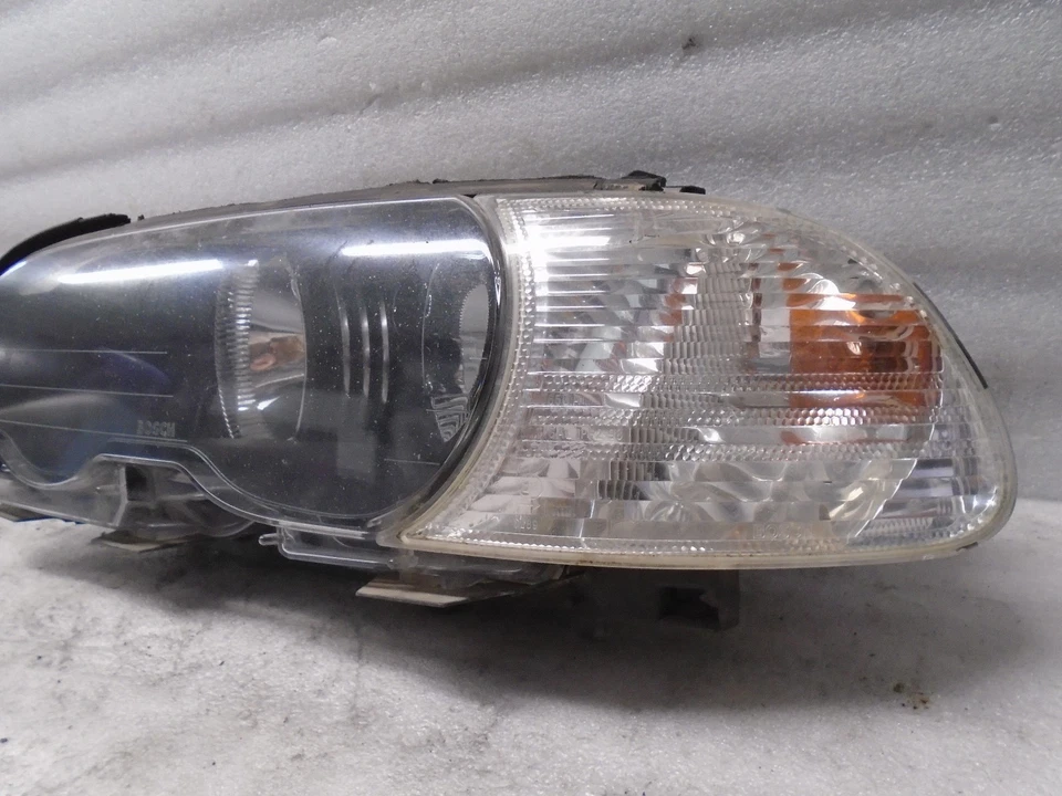 Faro halógeno delantero izquierdo BMW 325Ci E46 2001 OEM DK712234 Foto 2 de 4