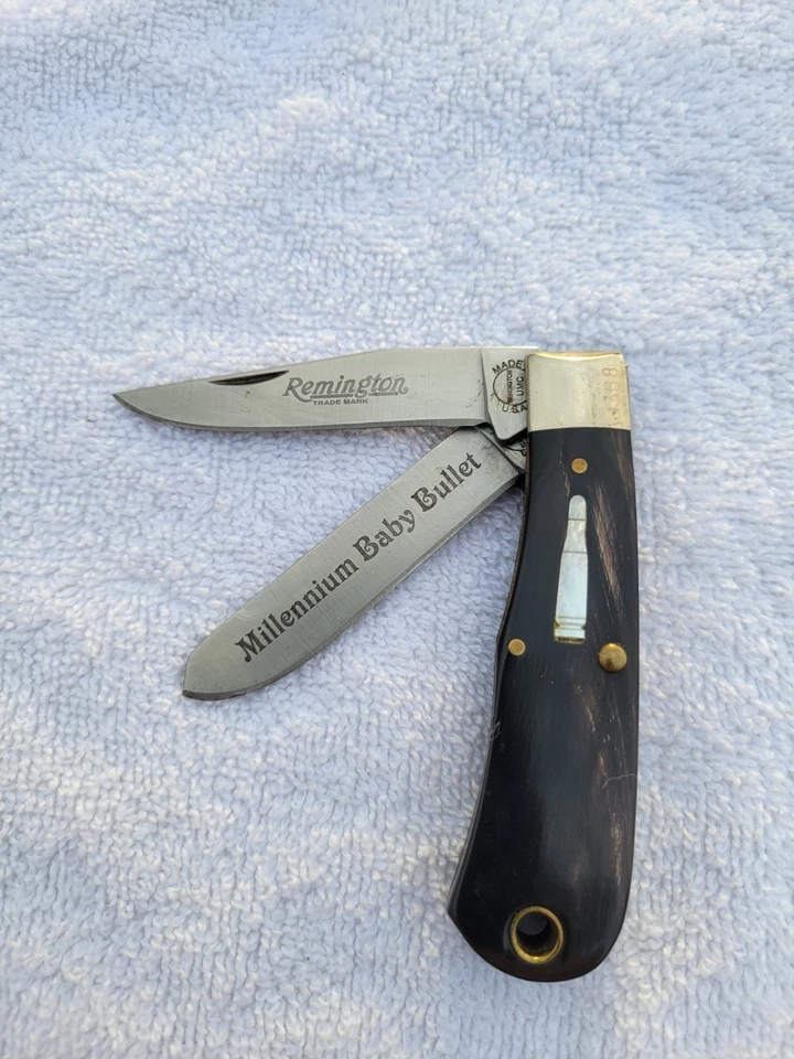 Cuchillo bala plegable Remington EE. UU. 2000 #R1173 cuerno de búfalo nuevo en caja Foto 2 de 4