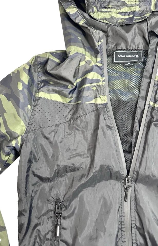 Chaqueta de lluvia Ocean Current para niños jóvenes Abrigo cortavientos Camuflaje Negro Verde Talla M Foto 2 de 4