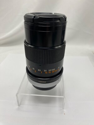 Canon FD mount  A  series 135m 1:3.5 lens both lens caps s/n 156352