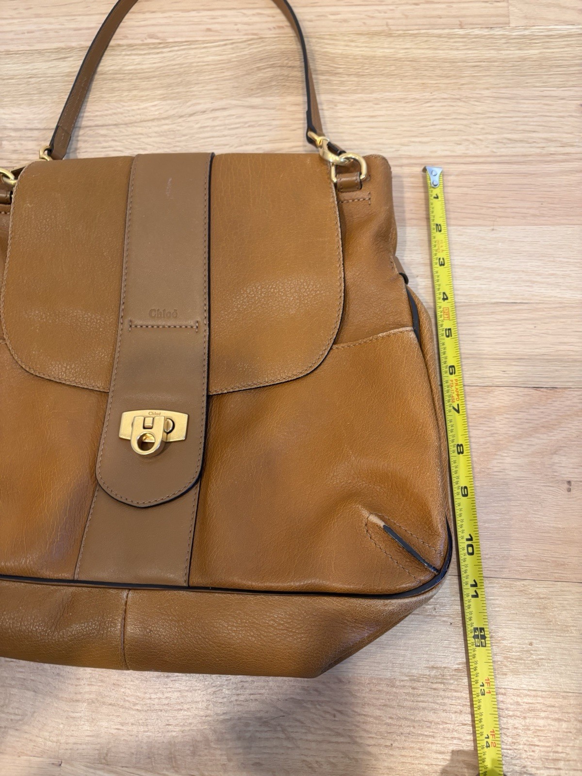 Chloé Lexa Medium Shoulder Bag featuring a distinctive gold-tone buckle closure image 6