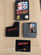 Thumbnail of ebay&reg; auction 157528576788 | Super Mario Bros NES Nintendo OVP mit Handbuch + Hülle + Case Protector