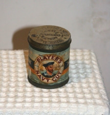 Antique Player’s navy cut cigarette tin round with paper labe