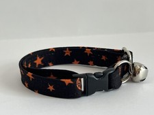 ORANGE MOONS AND STARS ON BLACK PRINT ADJUSTABLE BREAKAWAY CAT COLLAR