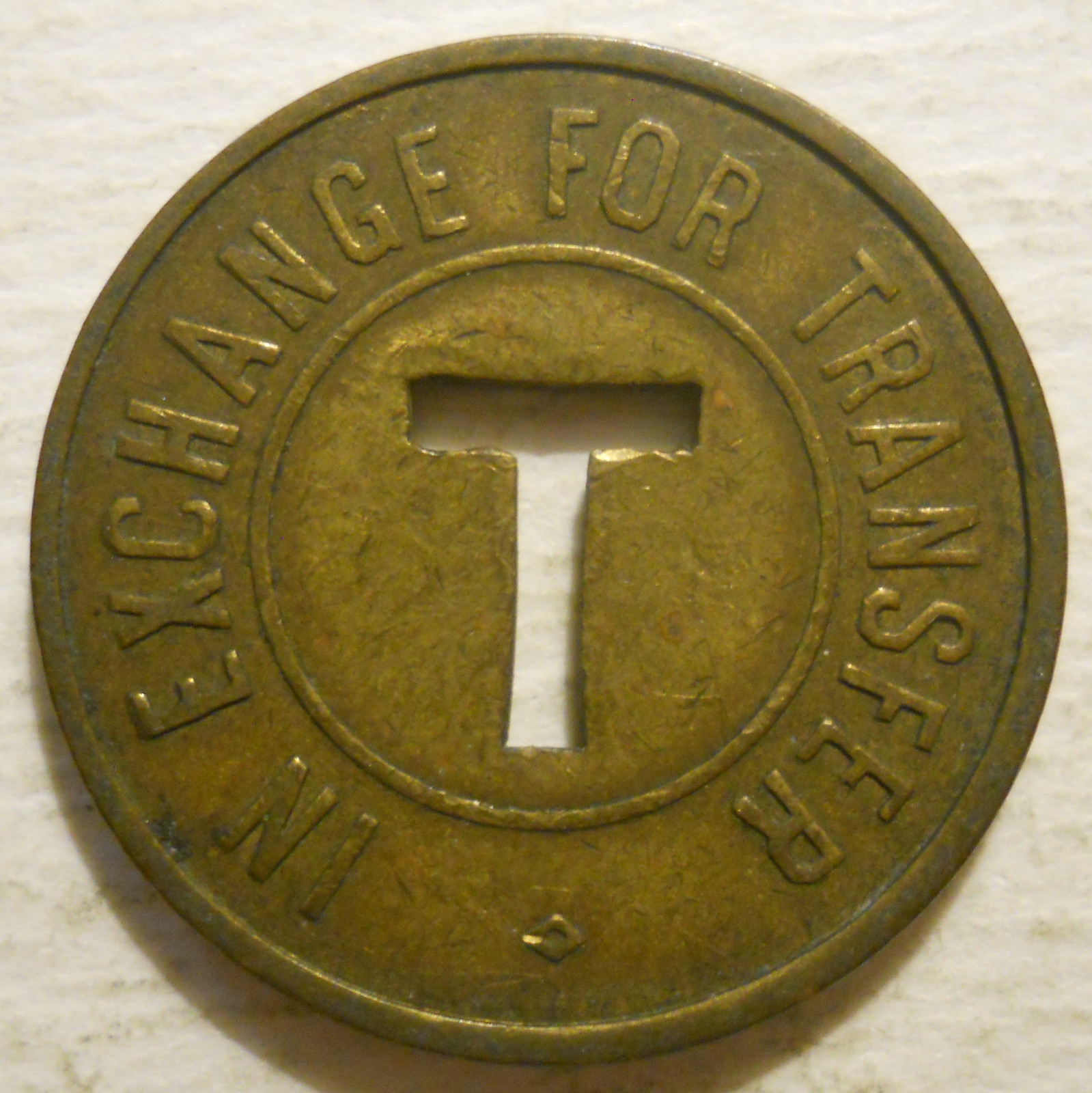 Triboro Coach Corp. (Queens, New York) transit token NY631L