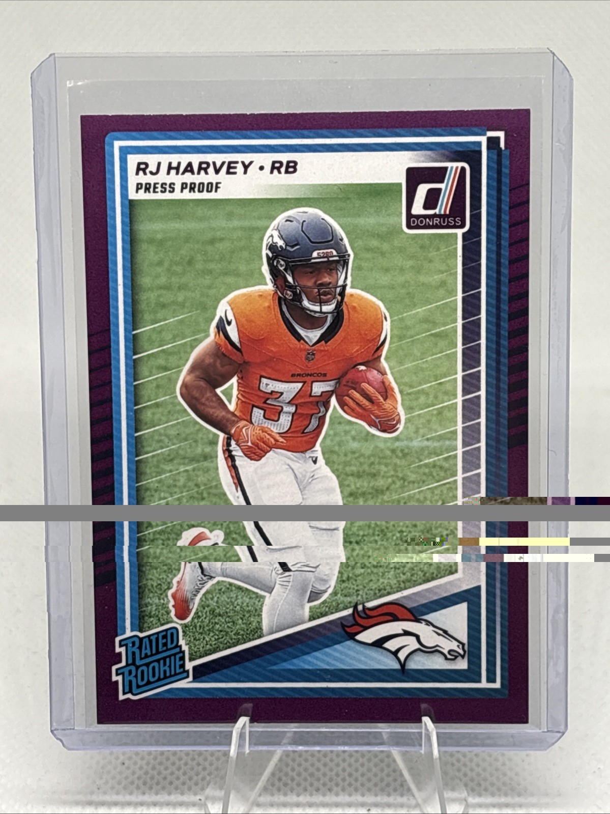 2025 Panini Donruss - Rated Rookie RJ Harvey #312 Purple Press Proof (RC)