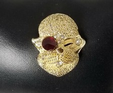 Ladies Gold Plated Dog Pin Brooch with clear Crystals and a red Crystal eye.