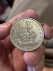 1877 s trade dollar Unc