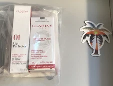 Clarins Bright Plus Advanced Brightening Dark Spot-Targeting Serum and lip