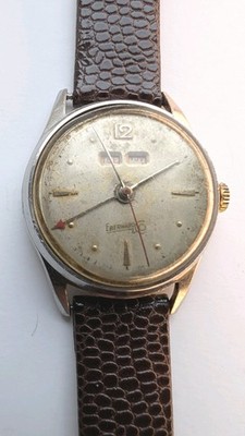 Vintage Eberhard & Co mechanical watch Triple calender .