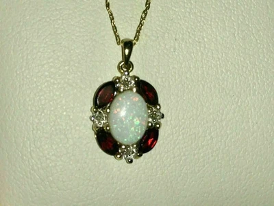 1,50ct Ovalschliff Feueropal & Granat Heiligenschein Anhänger 14K Gelbgold über gratis Kette - Bild 1 von 3