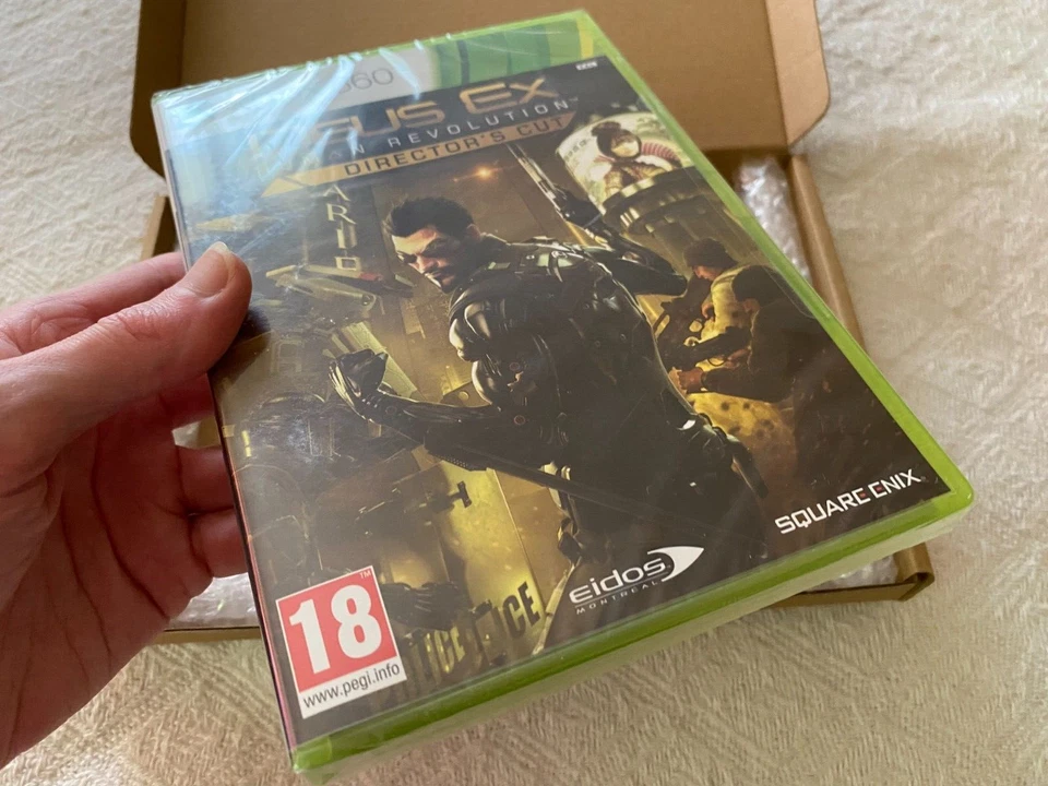 Deus Ex Human Revolution Directors Cut XBOX 360 - UK PAL New Sealed - Tracked - Image 2 of 4
