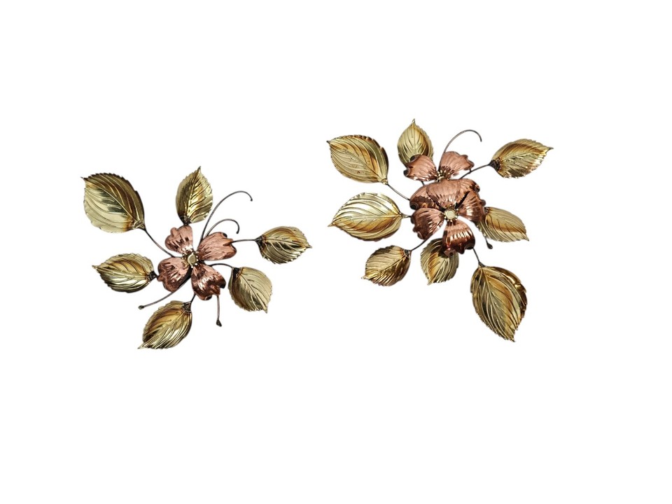 Copper and gold 3D metal floral wall sculpture — the kind of mid-century modern wall art that looks expensive in any room.