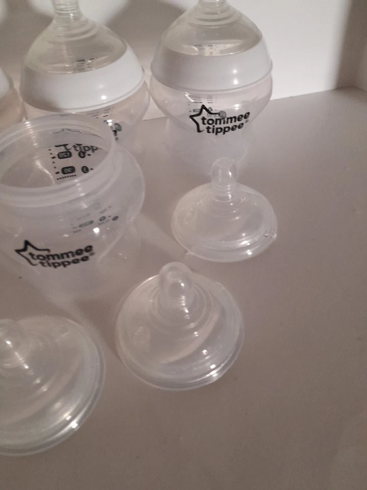 Tommee Tippee Botellas 5oz - 5 Botellas / 8 Pezones / 4 Llantas Transparentes - Llantas Blancas 17 TTL Foto 4 de 4