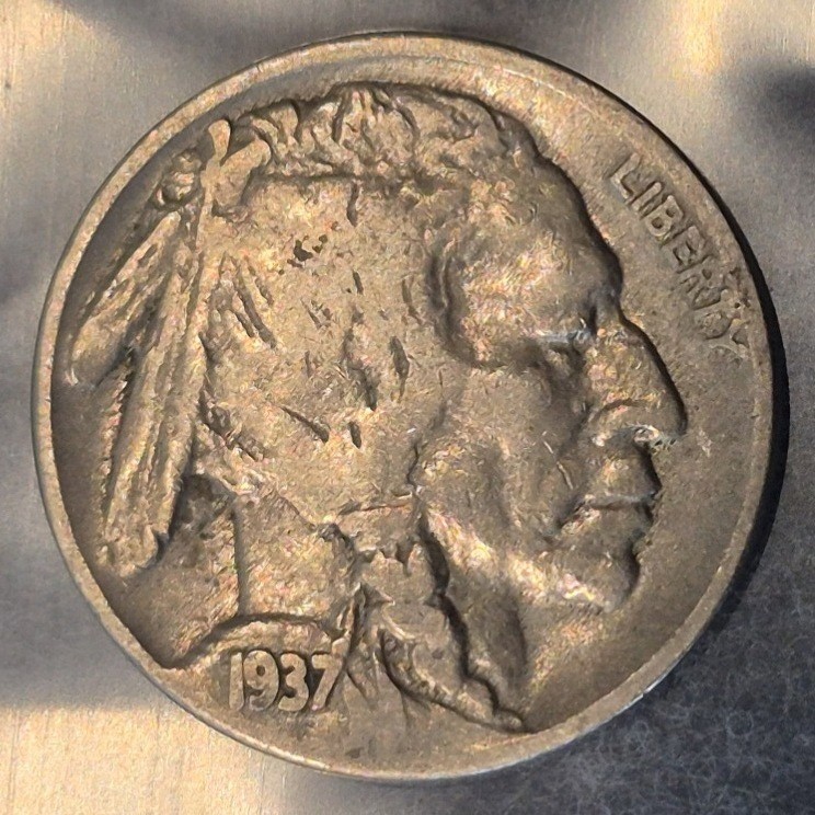 1937-D Buffalo nickel obverse, angled light