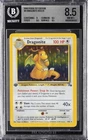 1999 POKEMON FOSSIL 1ST EDITION #4 DRAGONITE HOLO R BGS 8.5