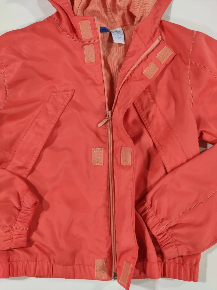 Chaqueta cortavientos Finish Line para mujer pequeña naranja con cremallera adulto Foto 4 de 4