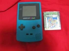 Gameboy Color Console and Super Mario Bros Deluxe Game Preowned.