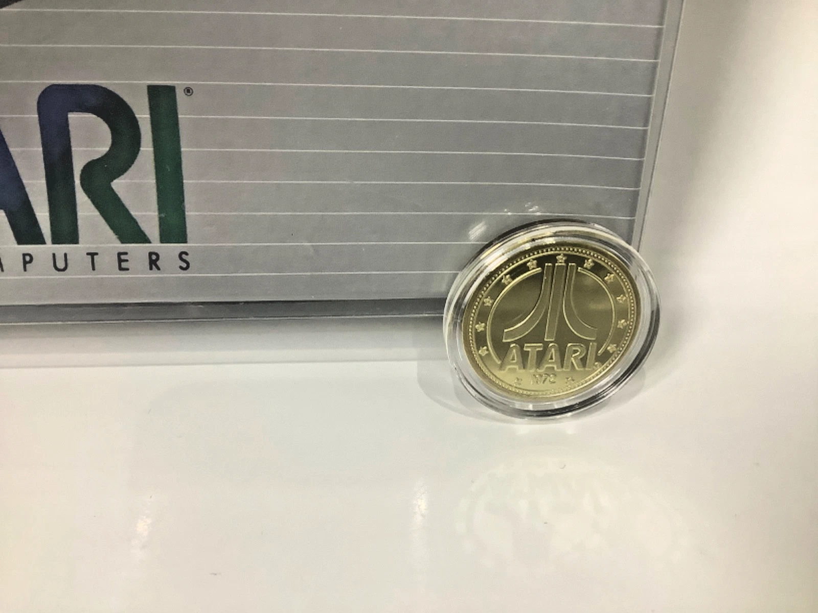 Additional photo for Vintage Atari 8-bit Football Game Cartridge (Sealed) with Atari Centipede Coin