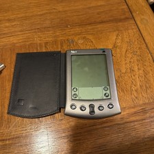 Palm Model V Ultra Slim Handheld Organizer comes w/ charger, sync,manual stylus